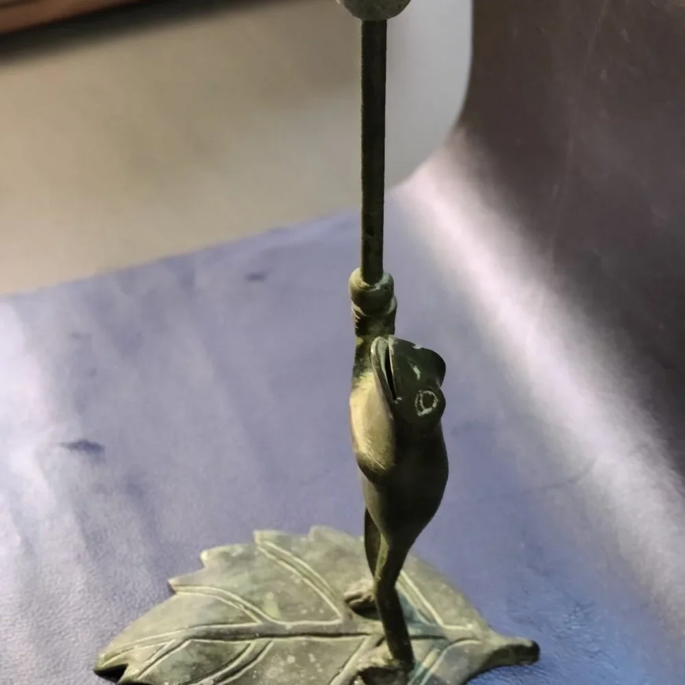 Brass Frog Sculpture holding a candlestick while floating on a lilypad 11